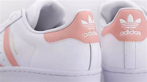 adidas white pink stripes|white and pink adidas sneakers.